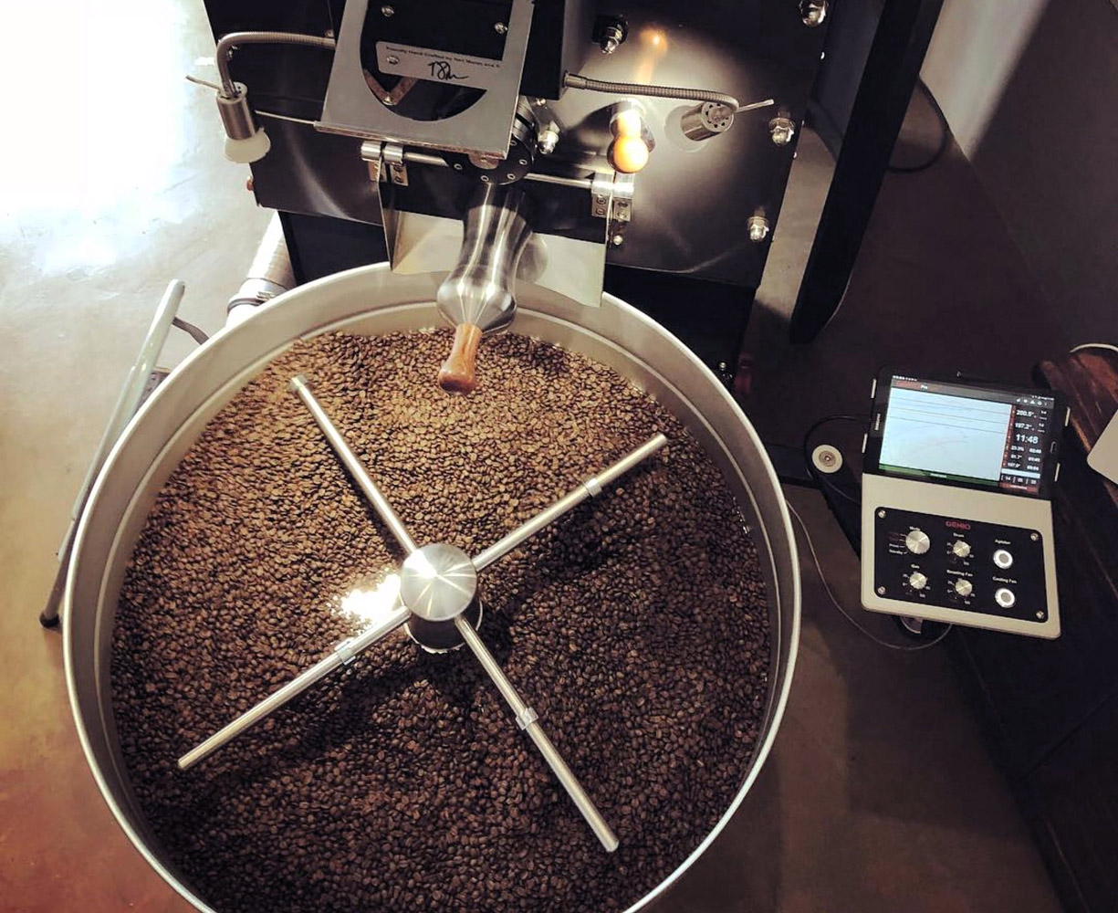 Close-up of coffee beans being expertly roasted to perfection at Silent Café